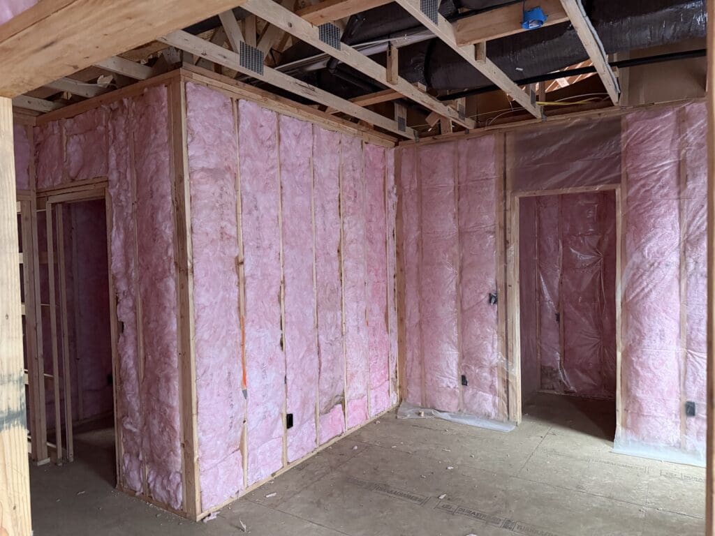 Room with batt insulation and vapor barrier